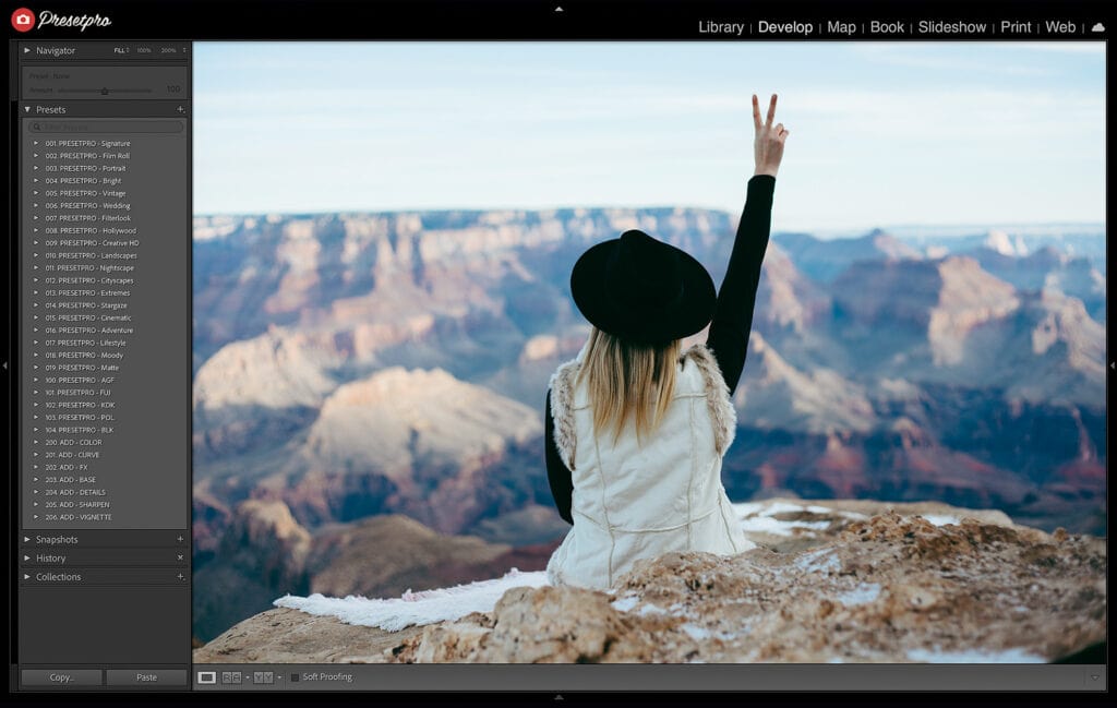 Screenshot of Lightroom showing the Kodak Ektar 100 Film Emulation preset applied to a photo of a person sitting at the edge of a canyon with a peace sign, demonstrating the editing process and preset usage