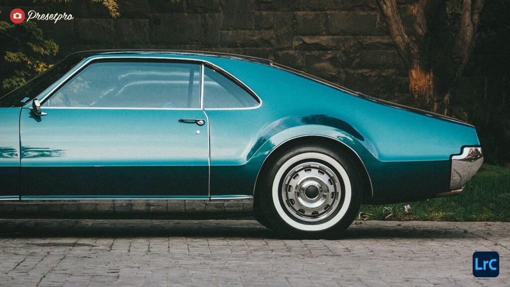 Side view of a teal vintage car edited with the Ektachrome Fade Lightroom preset