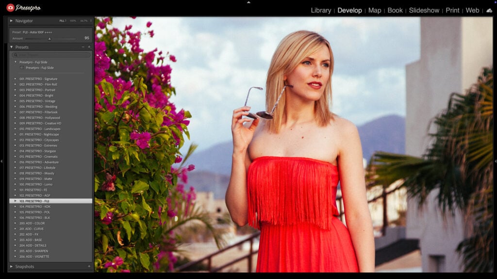 Adobe Lightroom Classic interface showing the Fuji Slide Free Lightroom Preset applied to a portrait of a woman in a red dress.