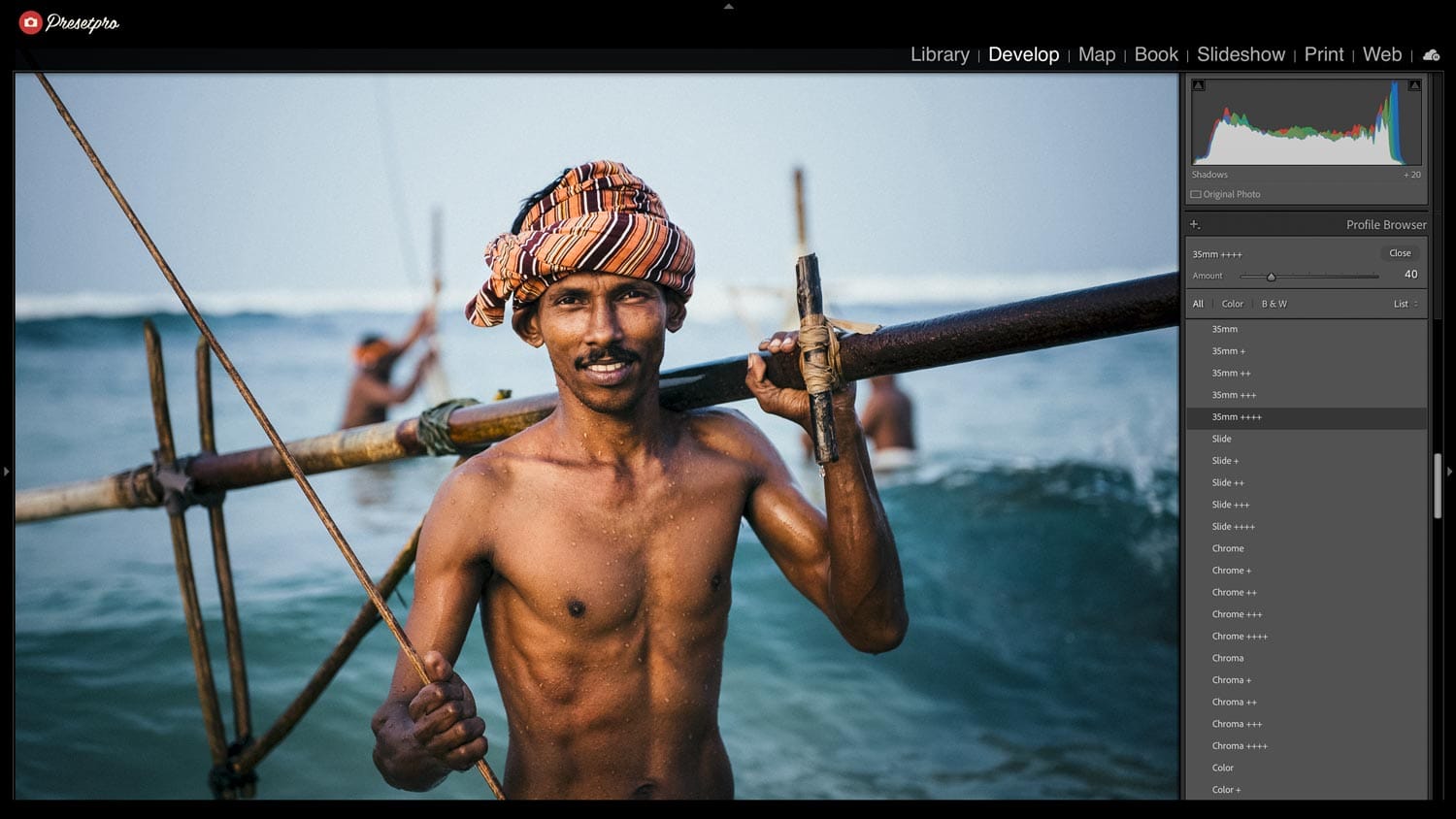Adobe Lightroom Classic interface displaying the right-side Profile Browser with the 35mm Slide emulation applied to a vivid travel portrait of a man in the ocean.